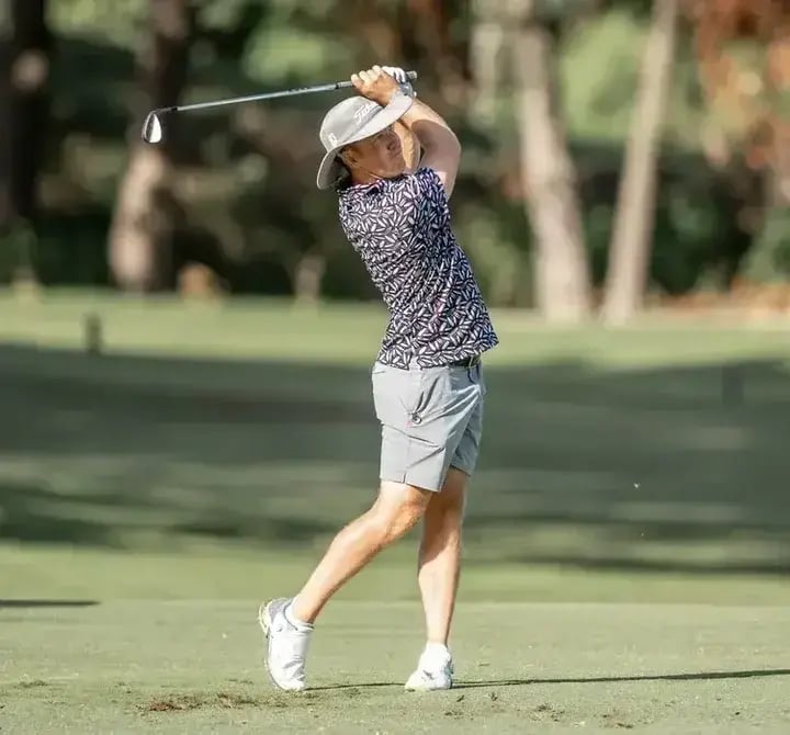 Golfer swinging