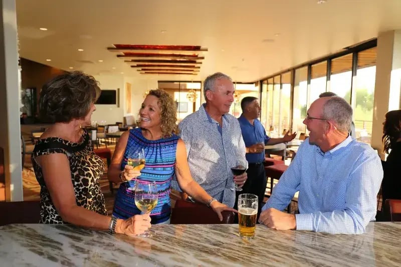 Ancala Members Celebrating at Bar