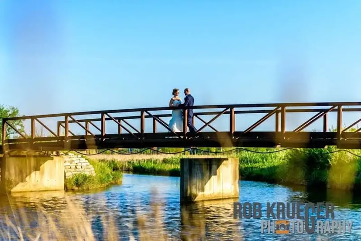 Eagle Brook Wedding Couple Bridge